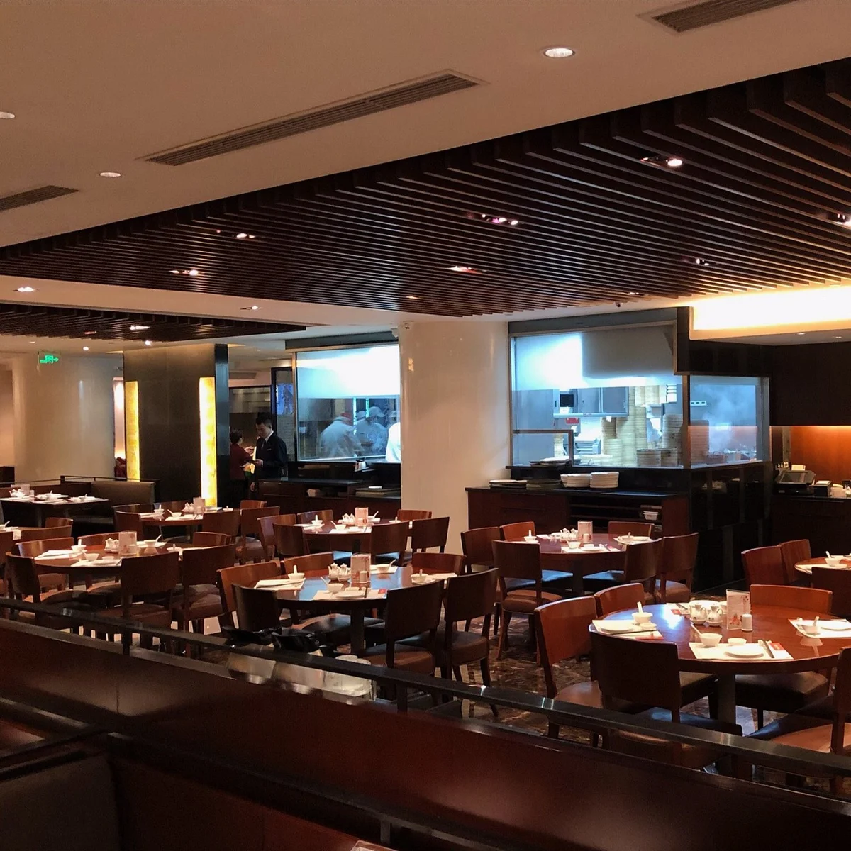 The Xin Tian Di flagship dining room — watch dumpling chefs at work through the glass-walled kitchen