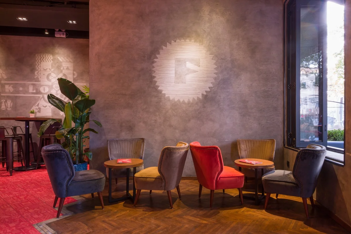 Relaxed sofa seating and warm industrial-chic decor make Funkadeli feel like a Milanese neighborhood bar in Shanghai