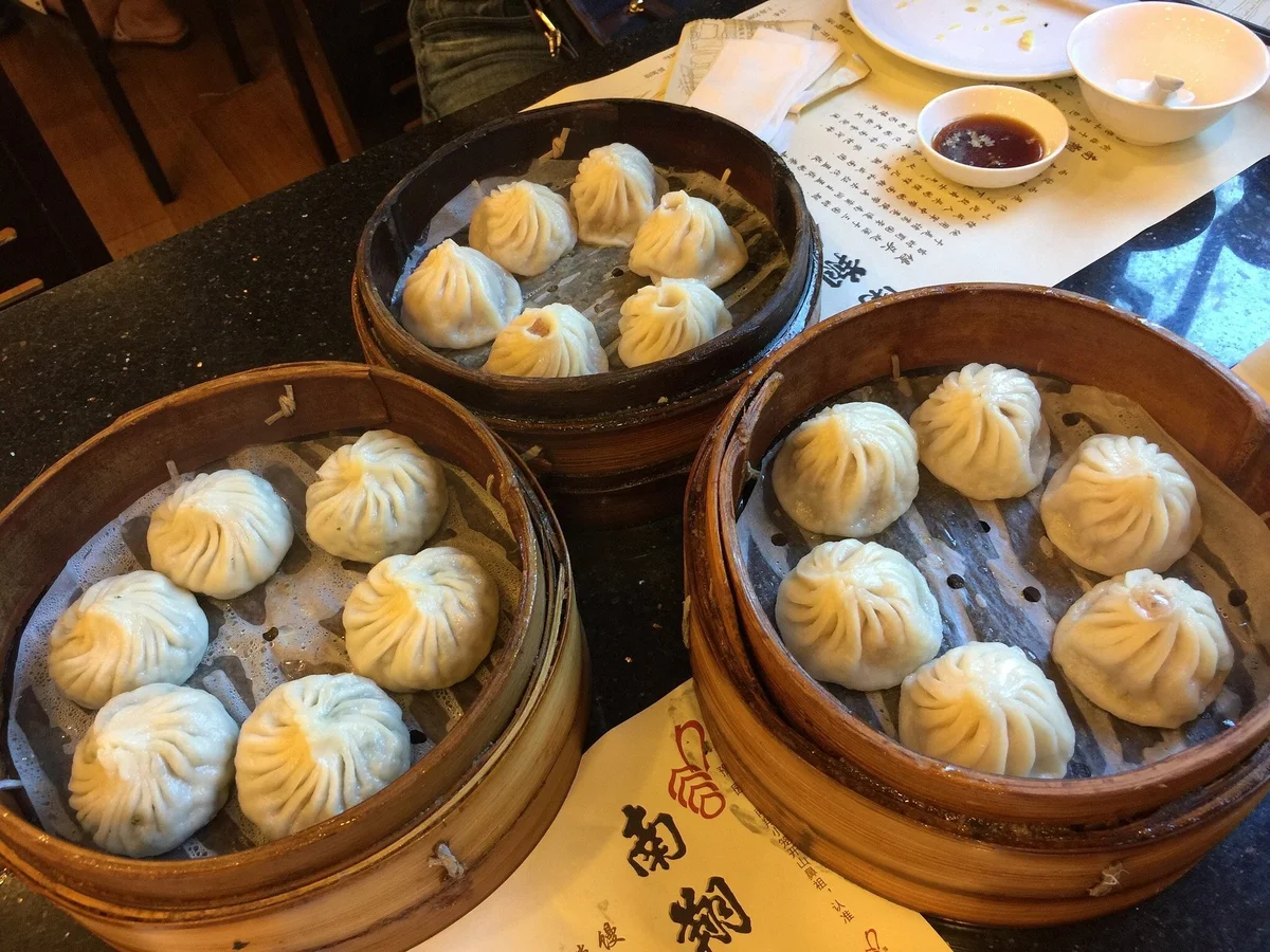 The classic pork xiaolongbao — thicker, rustier wrappers than modern versions, with abundant broth and pure pork flavor