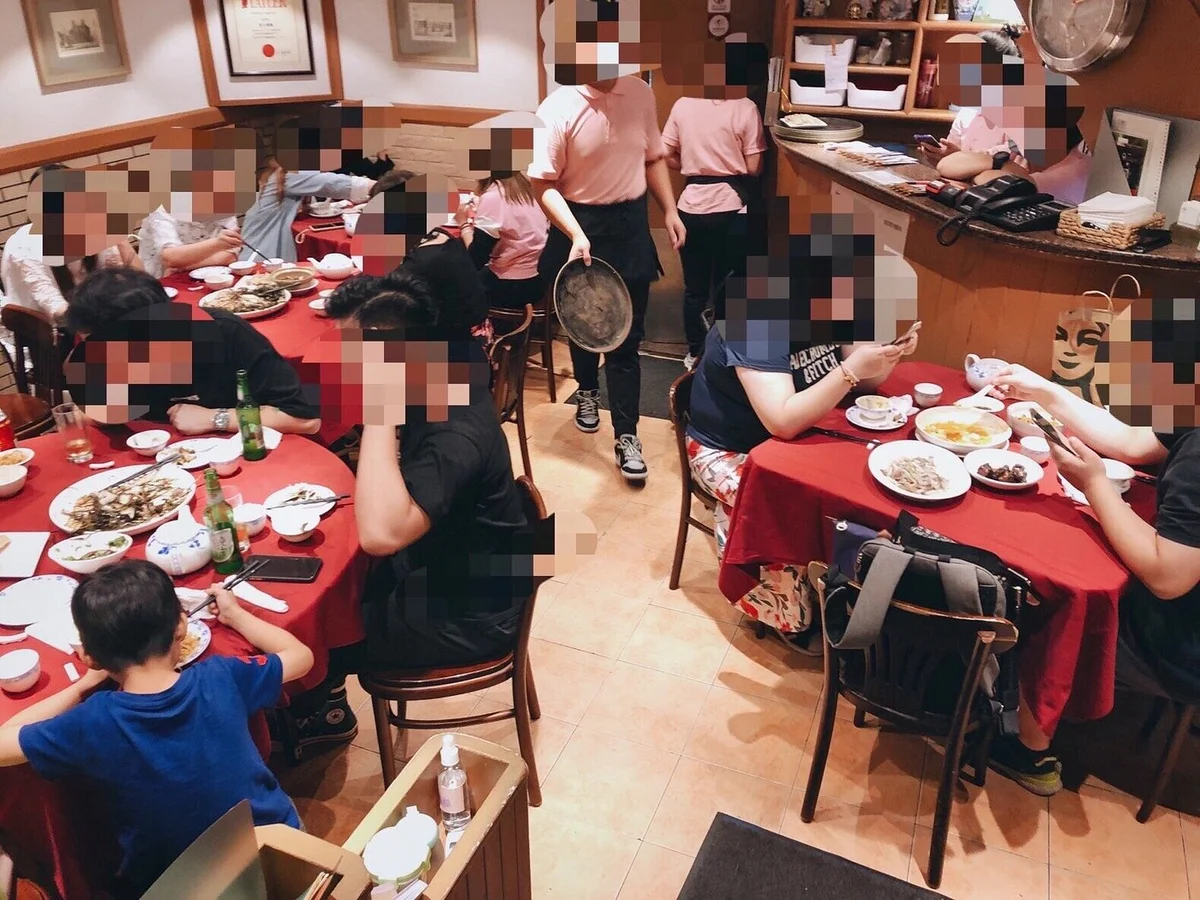 The cramped, fluorescent-lit dining room on Tianping Road — 30 seats, grandmotherly waitstaff, the soul of Shanghai on a plate