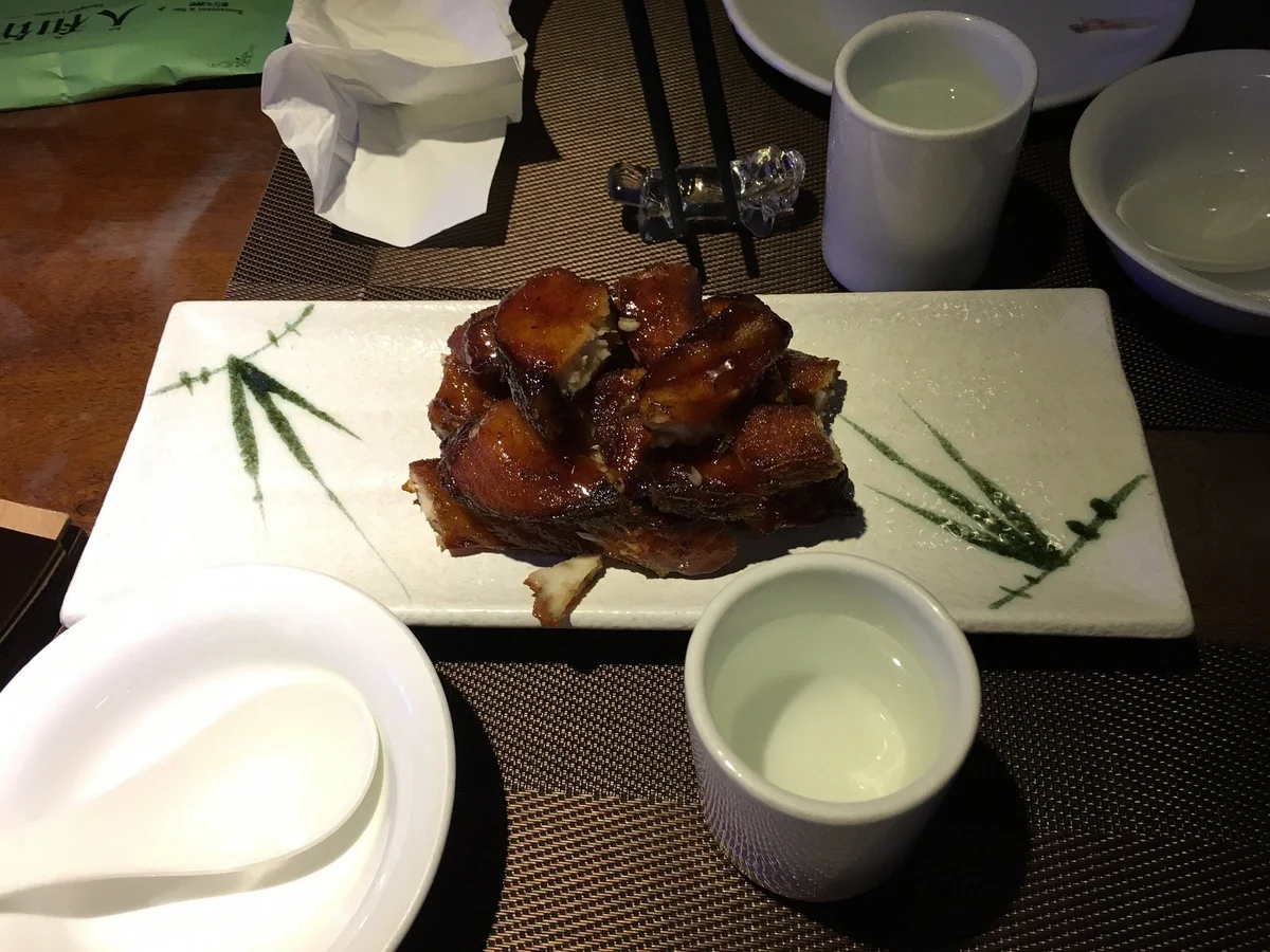 The award-winning hong shao rou — mahogany-glazed braised pork belly that's widely considered the best in Shanghai