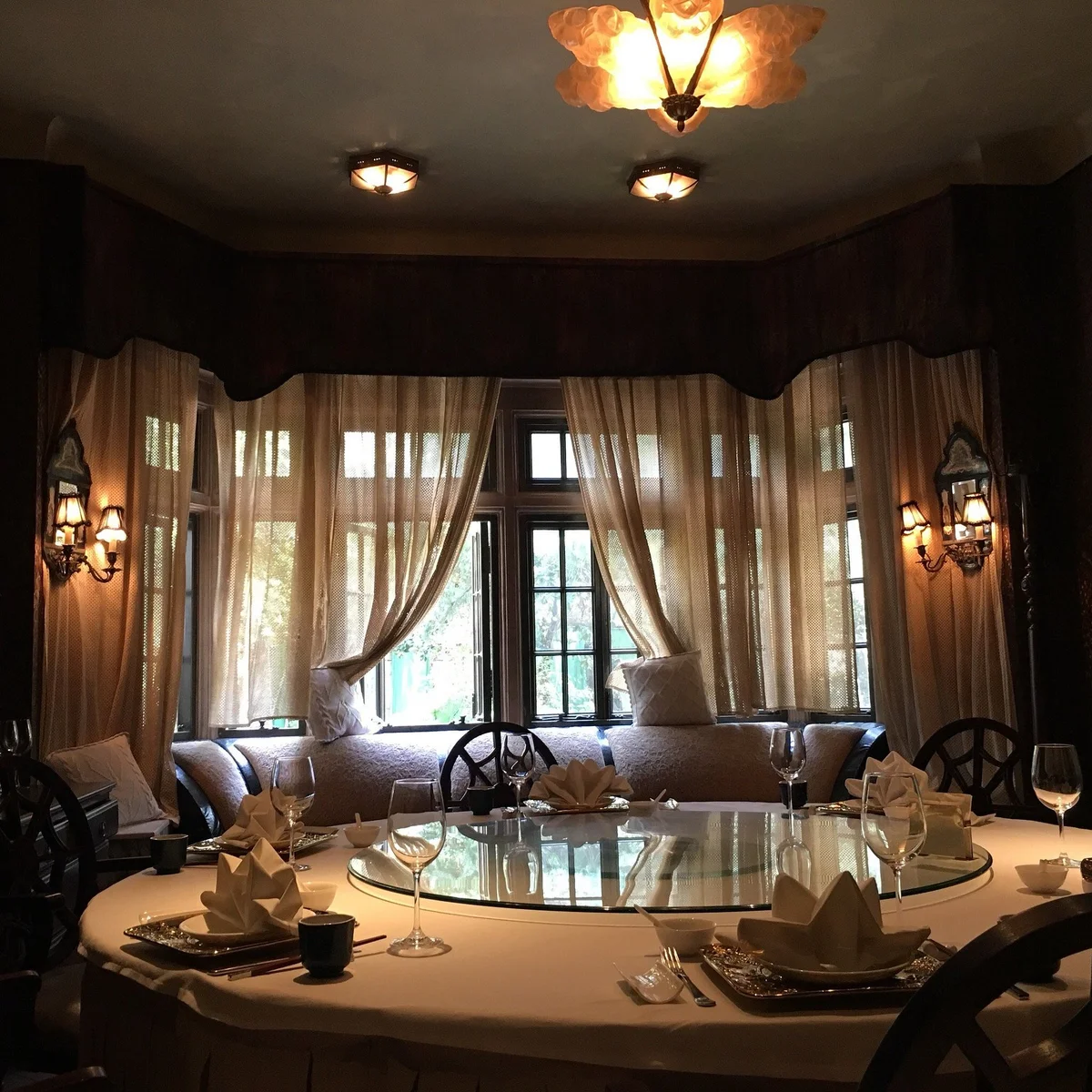 The 1930s Spanish-style villa and its half-acre garden — koi ponds, stone pathways, ancient camphor trees