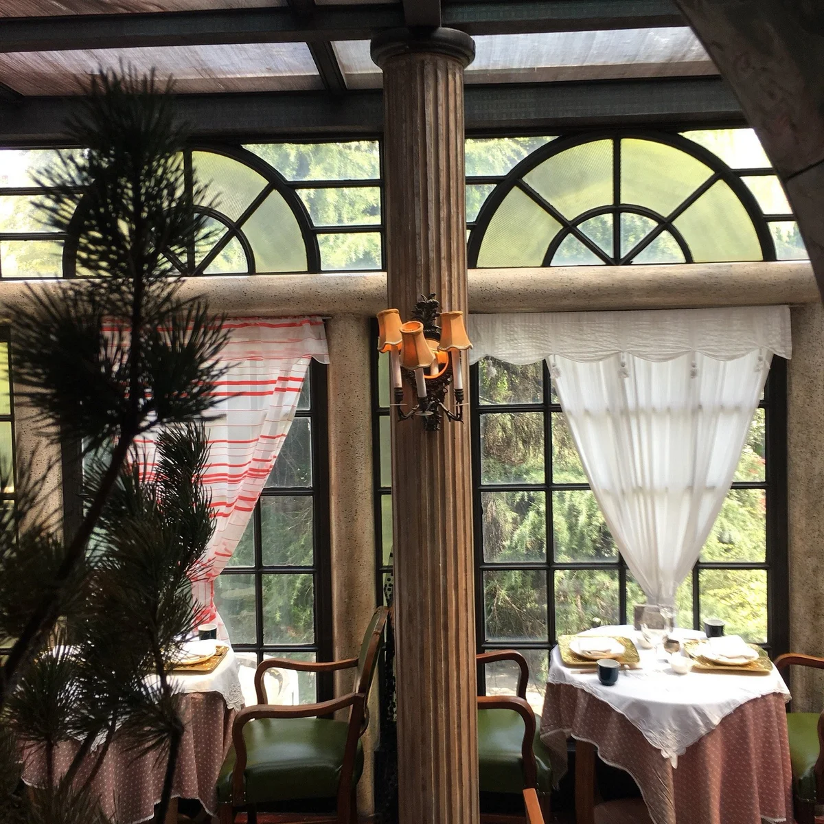 Inside the mansion: original parquet floors, Ming-inspired antiques, and shuttered windows overlooking the gardens
